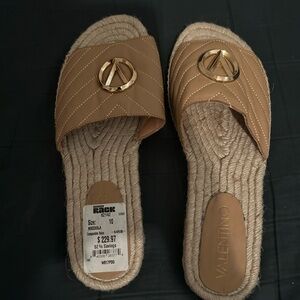 Woman’s sandals size 10 but really a size 9. Valentino